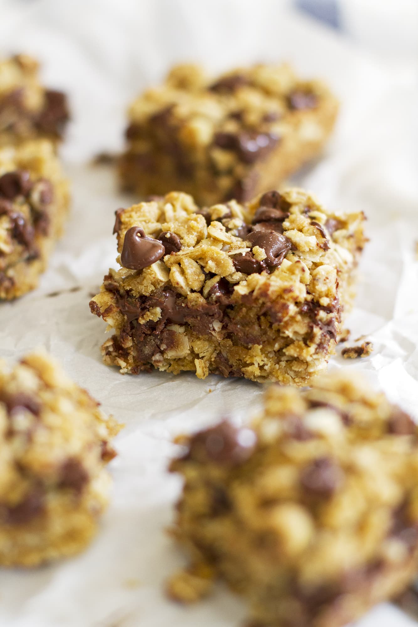 whole wheat oatmeal chocolate chip cookie bar on parchment