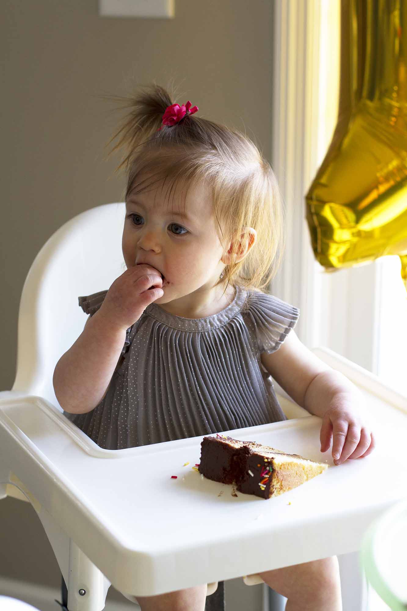 child eating cake