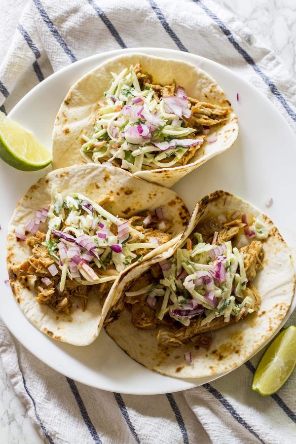 slow cooker green chile pork tacos on a plate