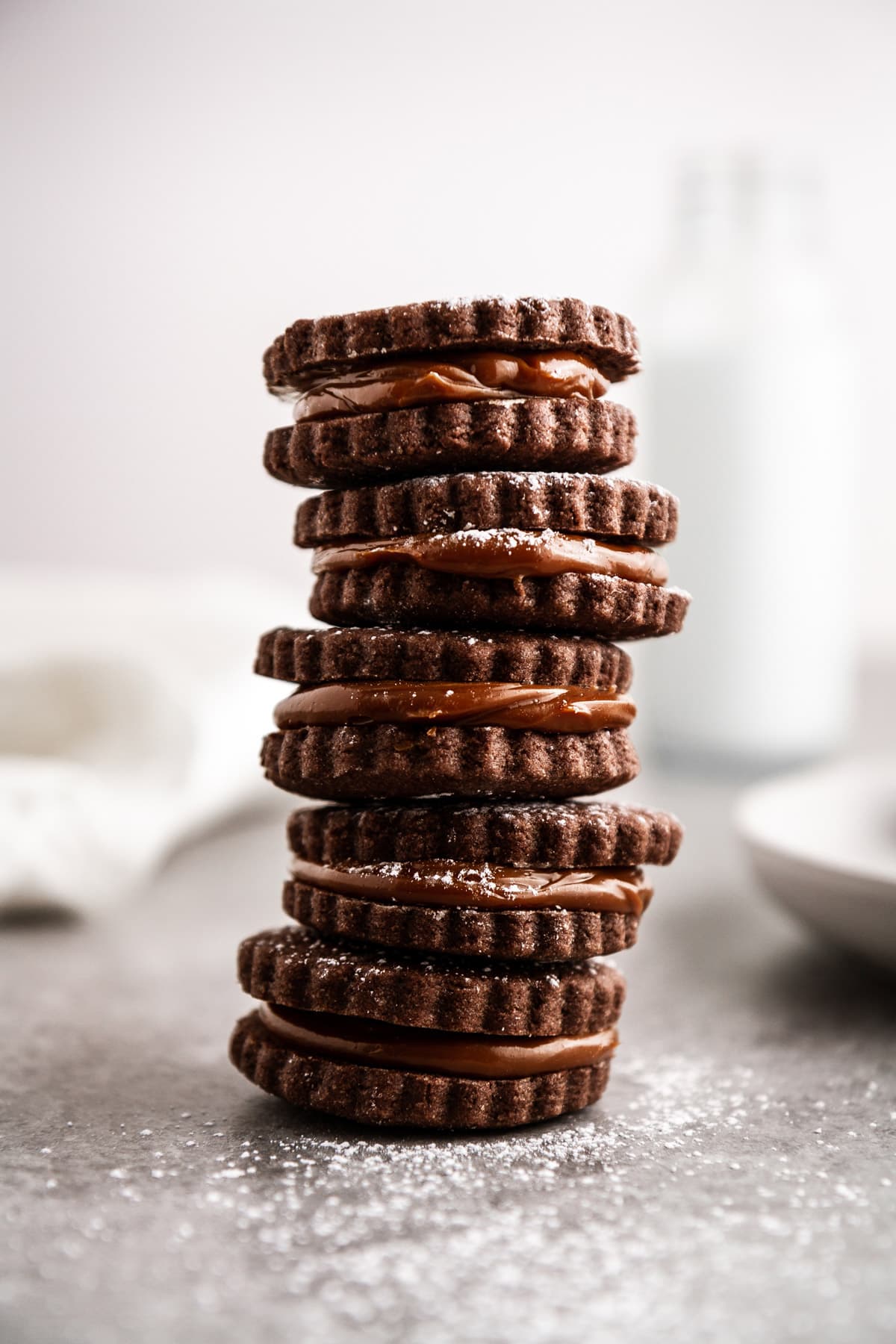 a stacked tower of chocolate alfajores