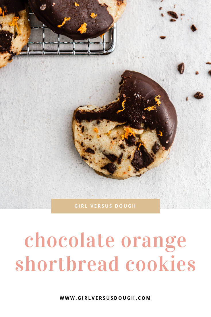 Slice and Bake Chocolate Orange Shortbread Cookies -- a chocolate chunk shortbread cookie recipe flavored with orange zest and dipped in chocolate. SO GOOD. @girlversusdough #girlverusdough #thecookies #chocolatechipcookie