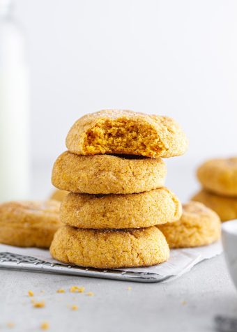 stack of pumpkin snickerdoodles on a cooling rack
