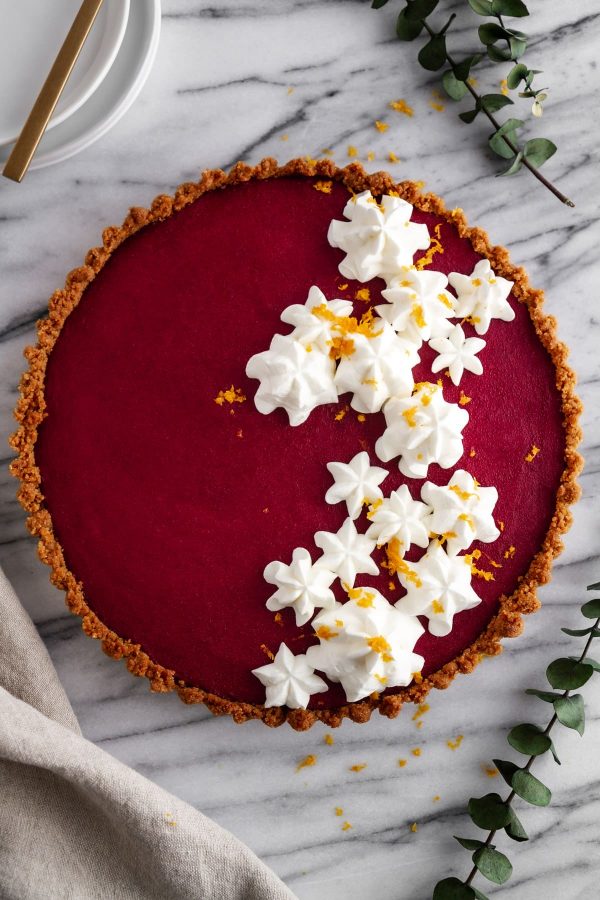 overhead shot of cranberry gingersnap tart on a surface
