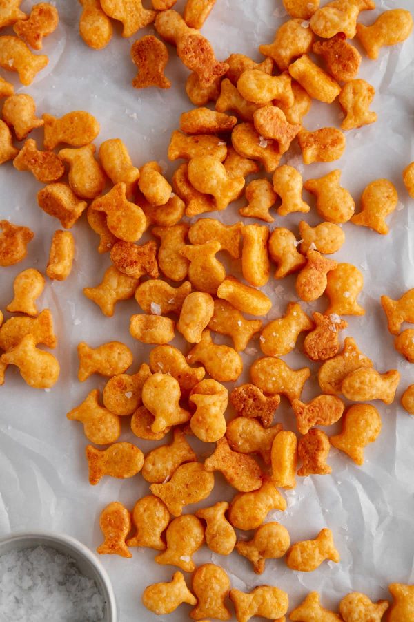 Homemade goldfish crackers on parchment paper