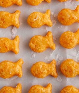 Homemade goldfish crackers on a surface