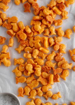 Homemade goldfish crackers on parchment paper